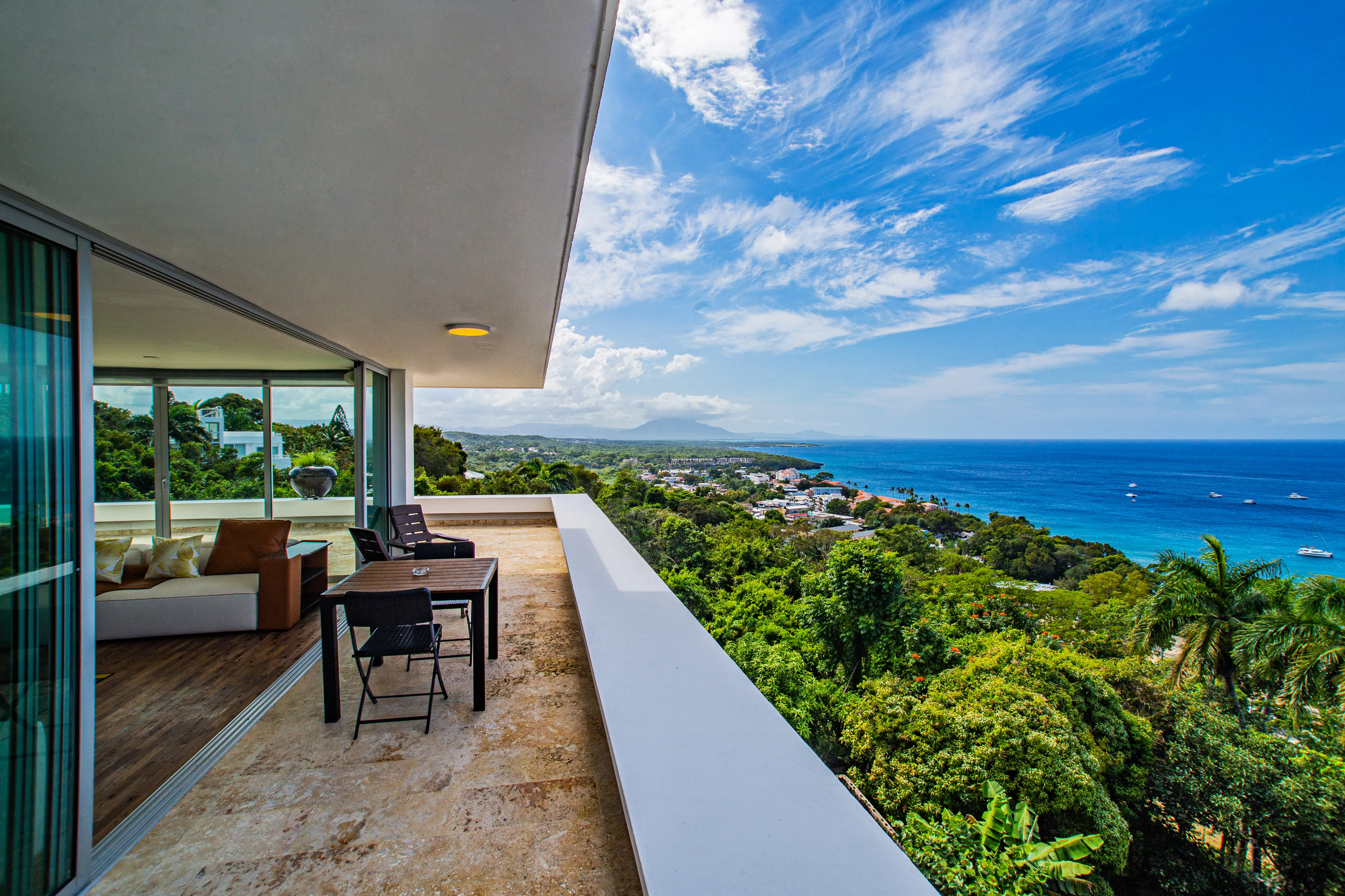 Wraparound terrace off the upper living room, open to the ocean