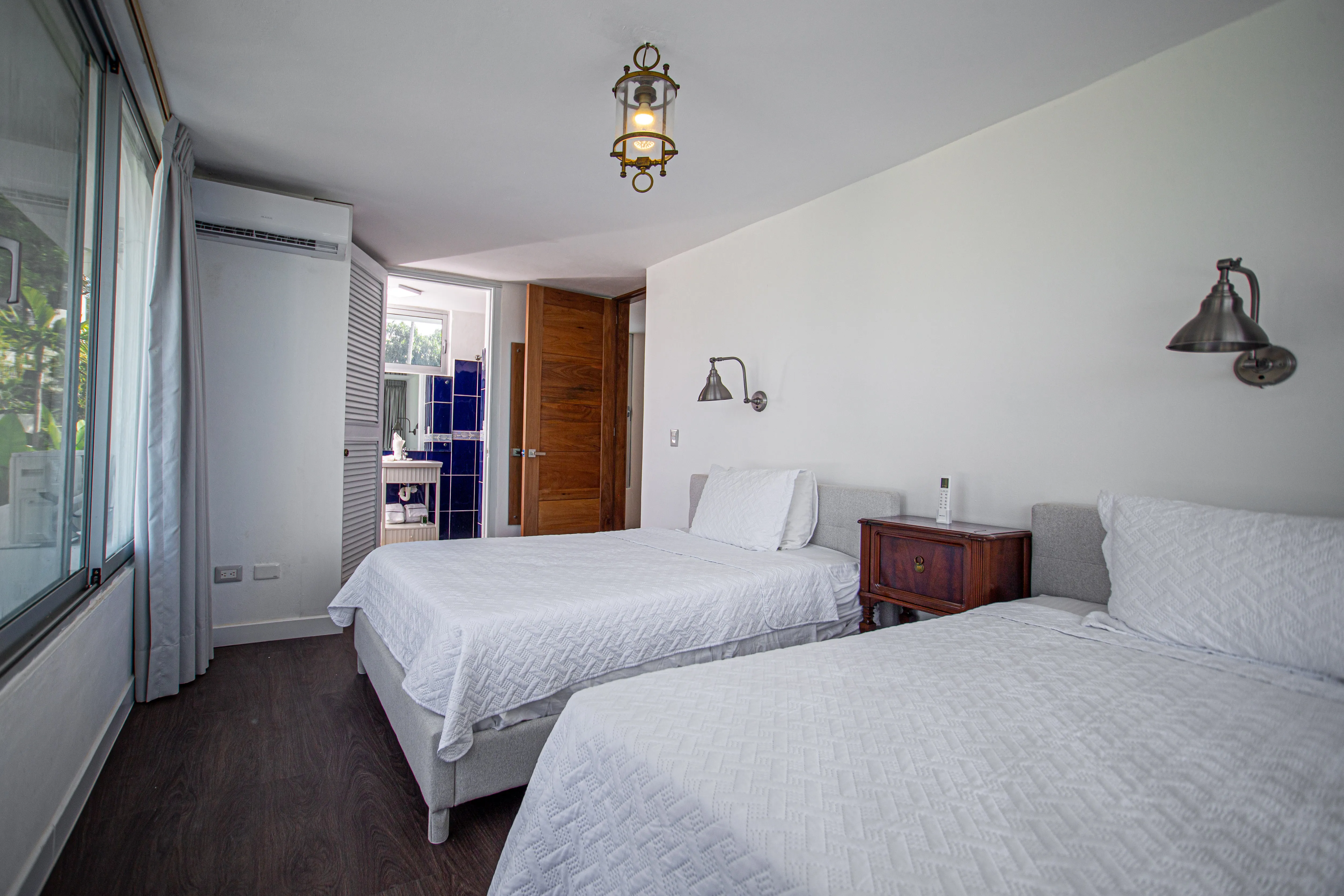 Bedroom 4 with two beds and an ensuite bathroom